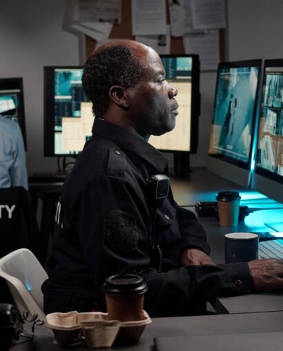 officers-working-in-surveillance-room-2025-03-17-16-37-41-utc-min