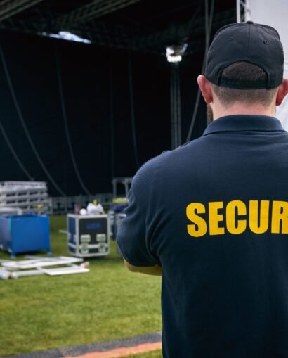 rear-view-of-security-team-at-outdoor-stage-for-mu-2024-10-21-02-11-31-utc-min